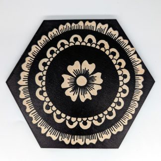 Hand-drawn black and white bold floral medallion original art hex wall tile by Bridget Koonce, UV printed on Baltic birch wood by HexWallTiles