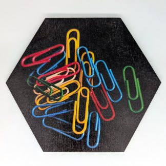 Colorful paper clips pop art hex wall tile on black ground, licensed art reproduction, UV printed on Baltic birch wood by HexWallTiles