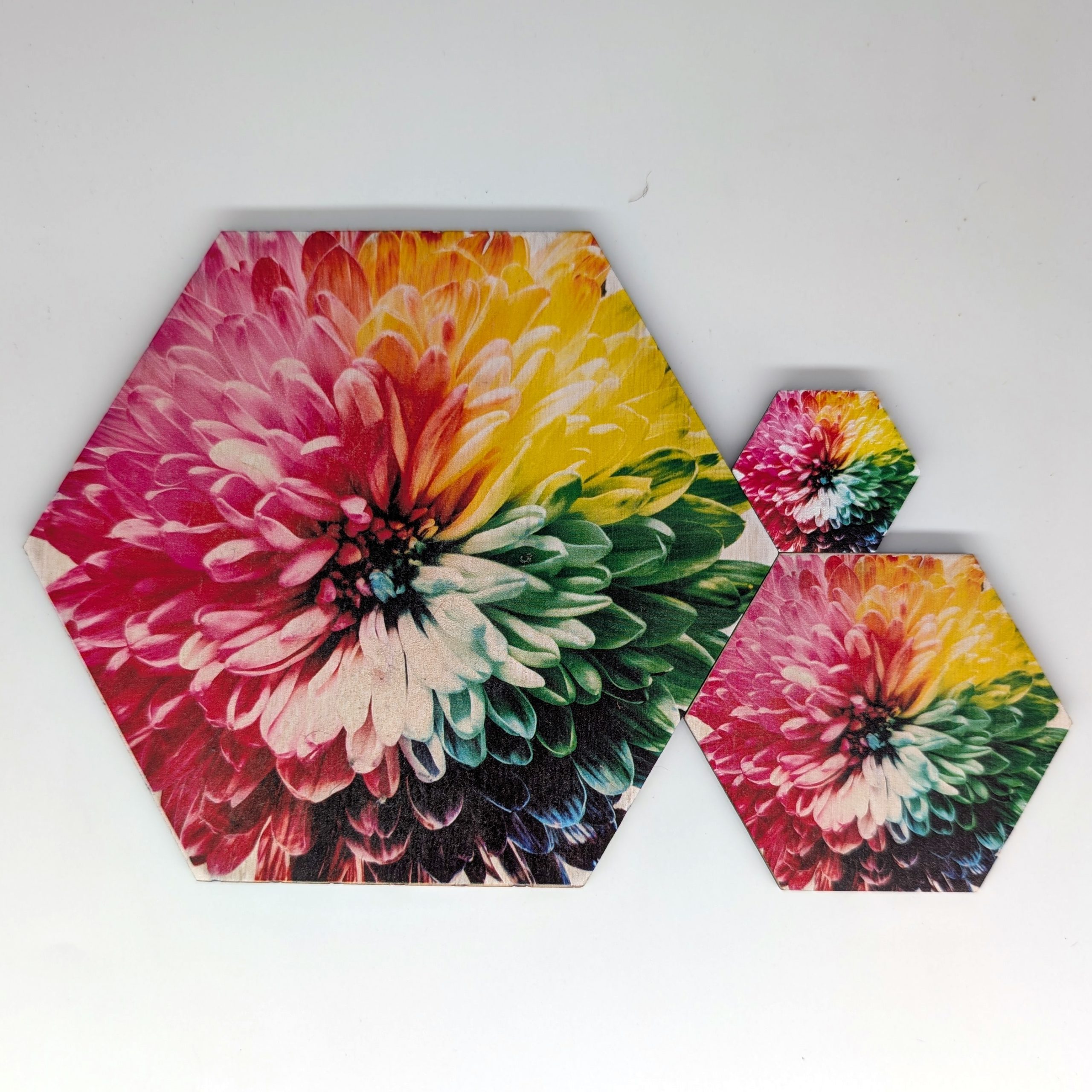 POP022 pop art hex wall tile shown in three sizes 6 inch 3 inch and 1.5 inch, UV printed on Baltic birch wood by HexWallTiles