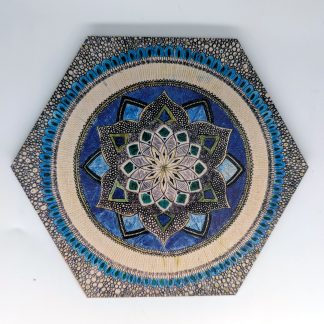 Hand-drawn blue and green dot mandala original art hex wall tile with stippled borders star flower center and concentric rings by Bridget Koonce, UV printed on Baltic birch wood by HexWallTiles