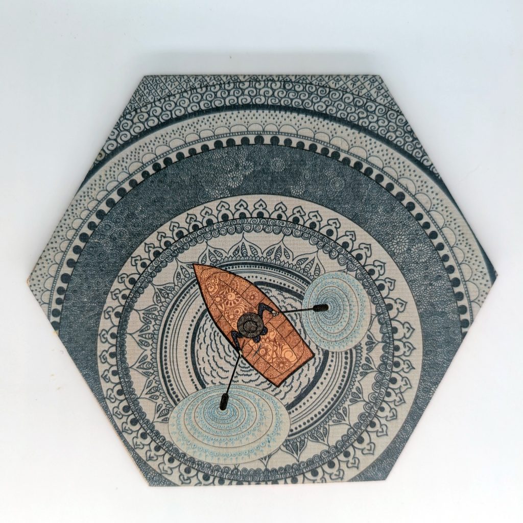 Hand-drawn lake life original art hex wall tile with mandala lake patterning and henna canoe detail by Bridget Koonce, UV printed on Baltic birch wood by HexWallTiles
